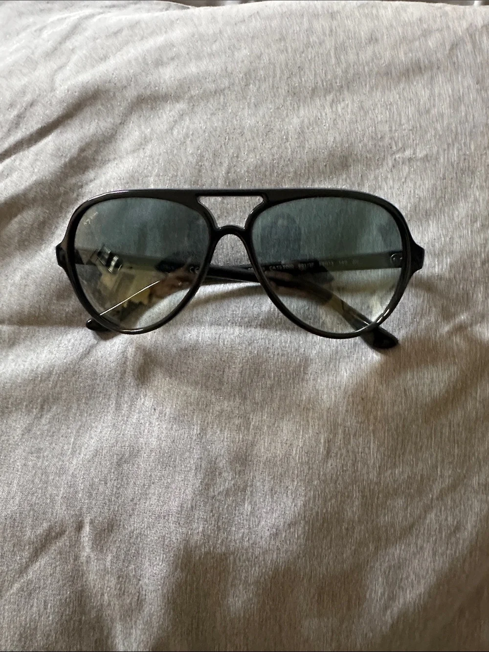 Ray-Ban Black Frame Sunglasses with Blue Tinted Lenses